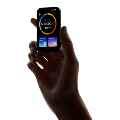 OneKey Pro 2 hardware wallet in black held in hand, showing the touchscreen home screen